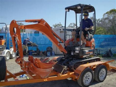 mini excavator on trailer stuck in the ground|agtalk mini excavator thread problems.